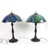 A pair of Christopher Wray Tiffany style table lamps with blue and green domed shades (one damaged)