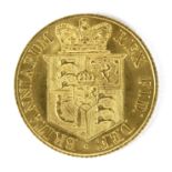 A George III gold half-sovereign dated 1817, approximately 3.