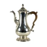 A George III silver coffee pot, Francis Butty & Nicholas Dumee, London 1765,