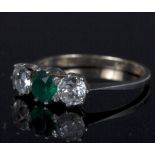 Lot Withdrawn - An emerald and diamond three-stone ring,