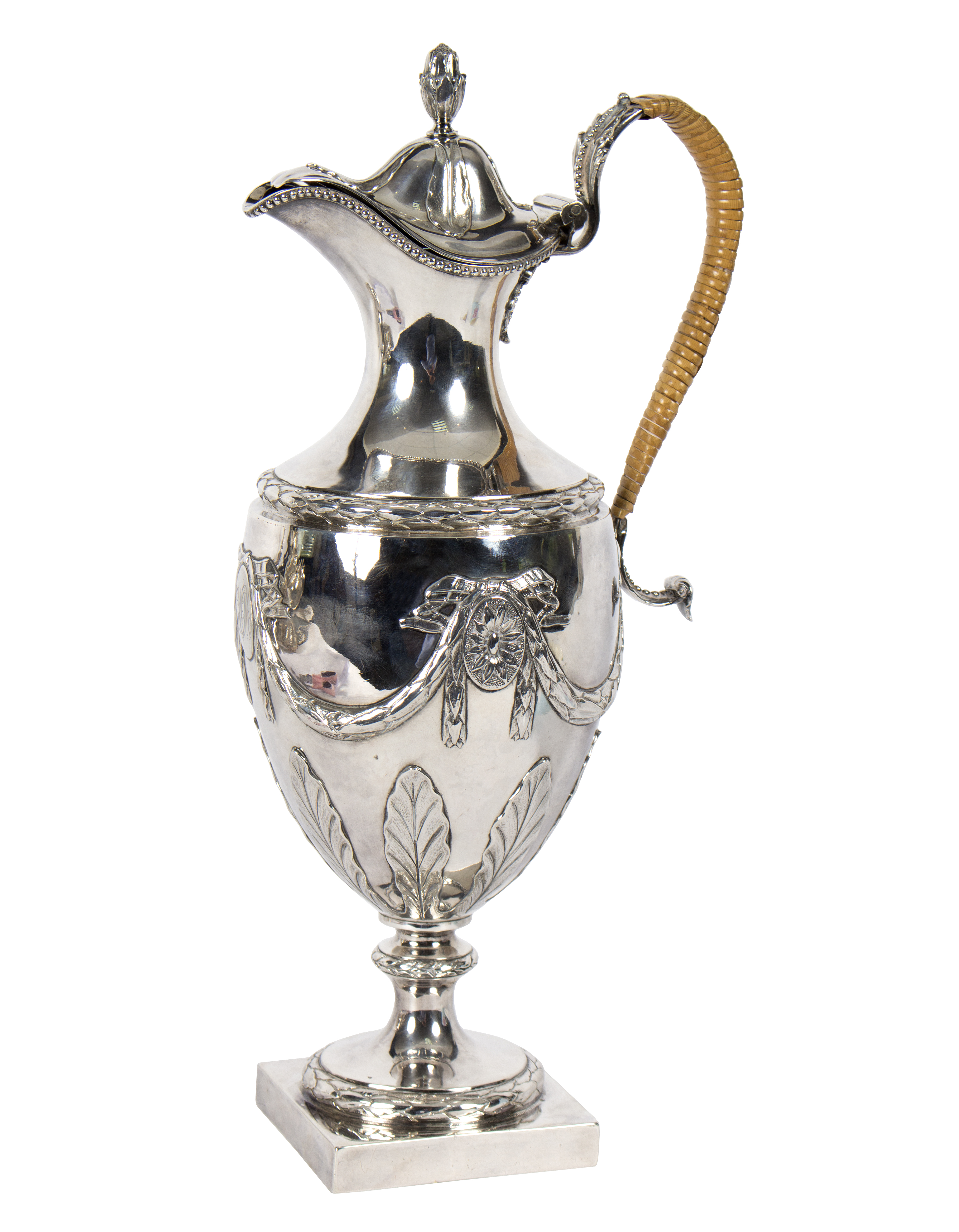 A Georgian silver claret jug, London 1776, decorated with swags, ribbons and acanthus leaves,