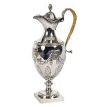 A Georgian silver claret jug, London 1776, decorated with swags, ribbons and acanthus leaves,