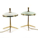 A pair of Italian mid 20th Century bedside lamps, with brass triform bases,