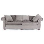 A Chesterfield style sofa upholstered in dove grey velvet,