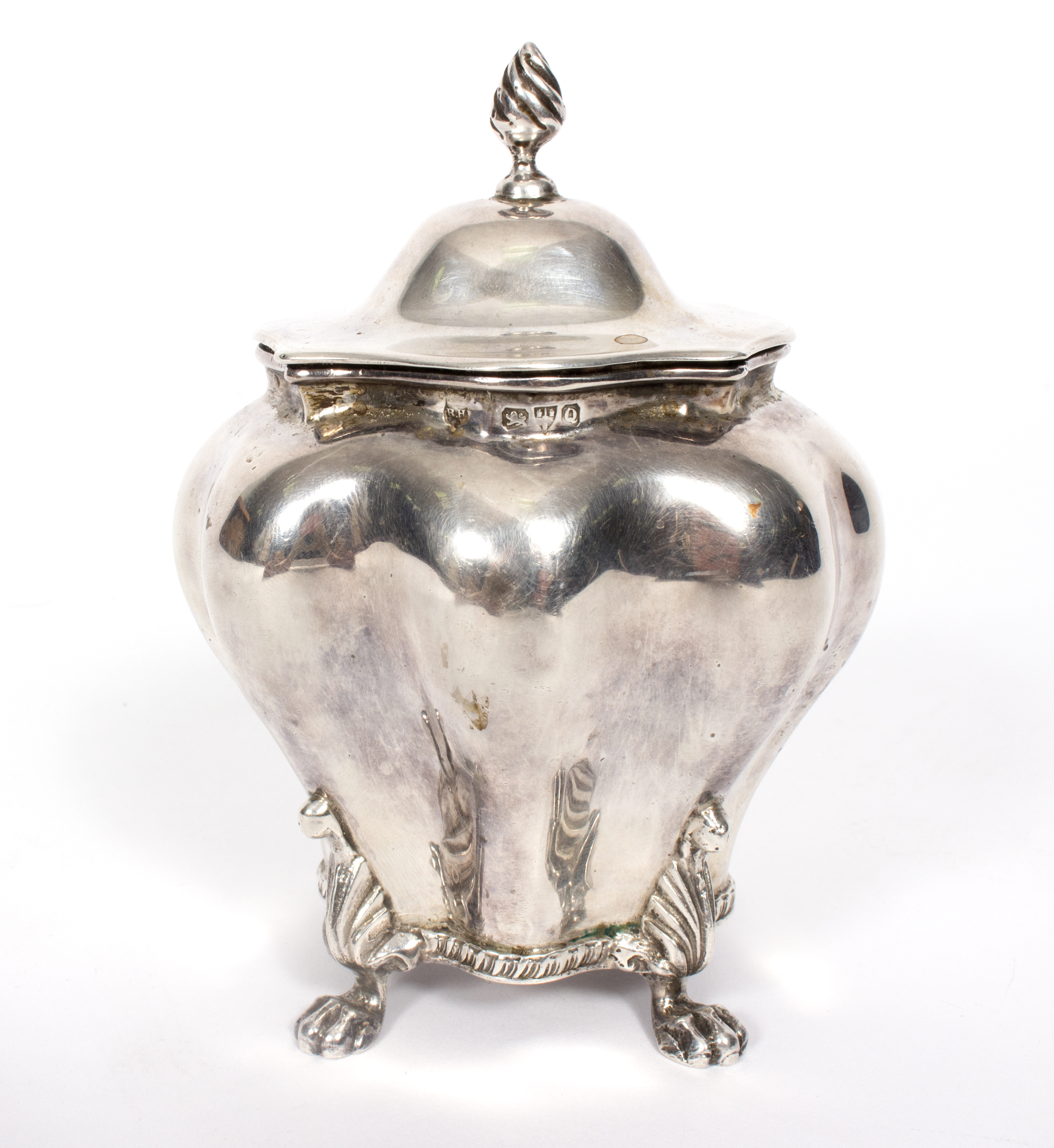 A silver sugar bowl, Chester 1899, of bombé tea caddy form,