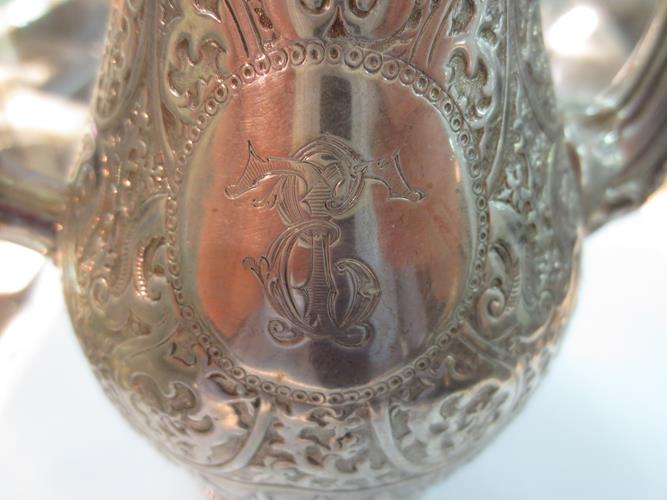 A Victorian silver coffee pot, Charles Stuart Harris, London 1879, with Eastern style decoration, - Image 3 of 4