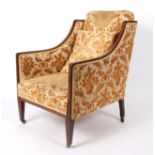 A Victorian square shaped armchair,