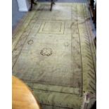 An Eastern rug with stylised motifs, 385cm x 216cm Condition Report: Very worn,