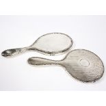 A silver-backed hand mirror,