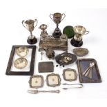 Two silver trophies with Kiambu Club inscriptions, a set of six coffee spoons with bean terminals,