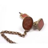 A Georgian seal fob, the oval carnelian matrix depicting a Classical youth in profile,