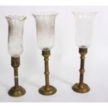 A pair of brass candlesticks,