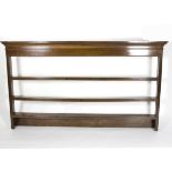 A 19th Century hanging shelf, with moulded cornice,