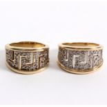 A pair of diamond set 9ct gold rings, each with Greek key design,