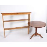 A set of Victorian pine hanging wall shelves, 135cm wide and a tripod table,