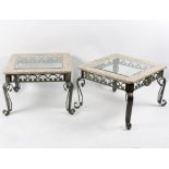 A pair of glass topped faux marble occasional tables, with painted metal scrolling legs,