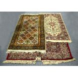 A modern Tabris carpet worked in reds, yellows and blues to a cream ground,