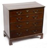 An early 19th Century mahogany chest of four long drawers raised on bracket feet, 82.