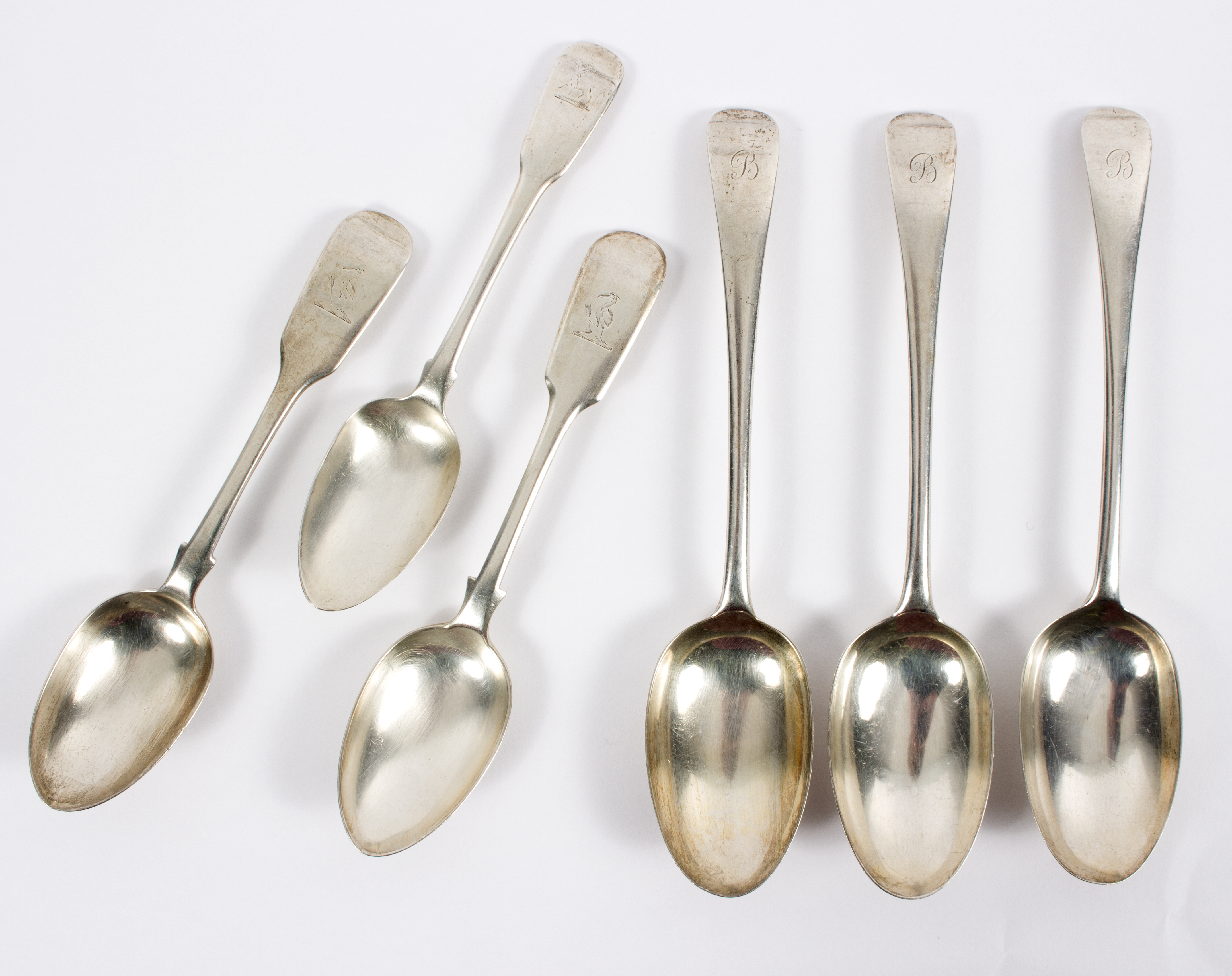 Three silver Old English pattern tablespoons, London 1918 and three other silver spoons,