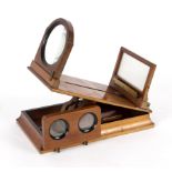 A Victorian table-top stereoscopic viewer,