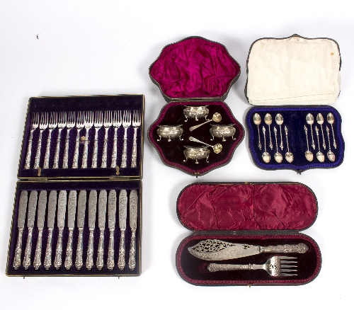 A set of four silver salts, marks rubbed, of lobed form, twelve silver apostle teaspoons, HW,