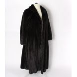 A dark brown mink fur coat,