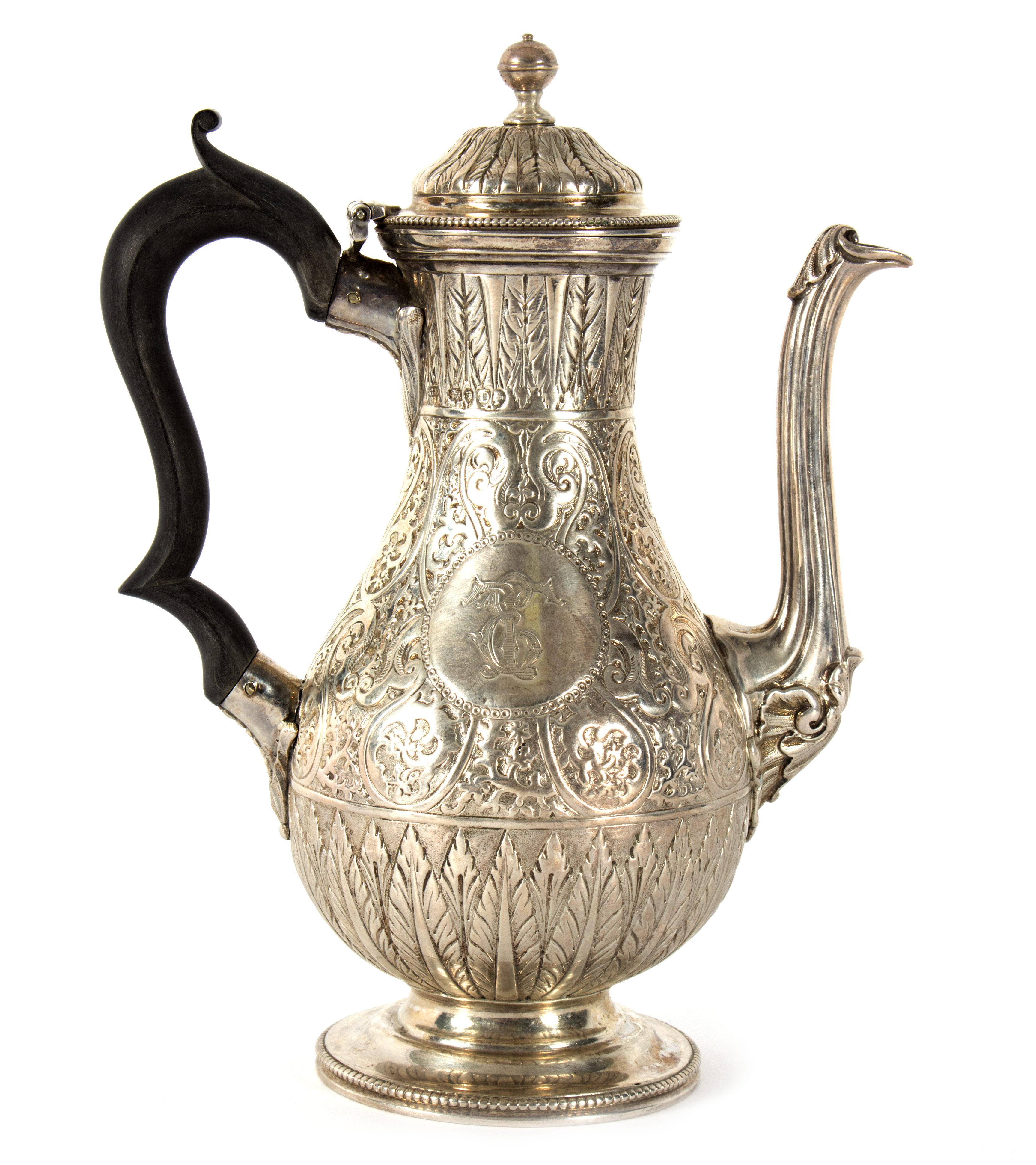 A Victorian silver coffee pot, Charles Stuart Harris, London 1879, with Eastern style decoration,