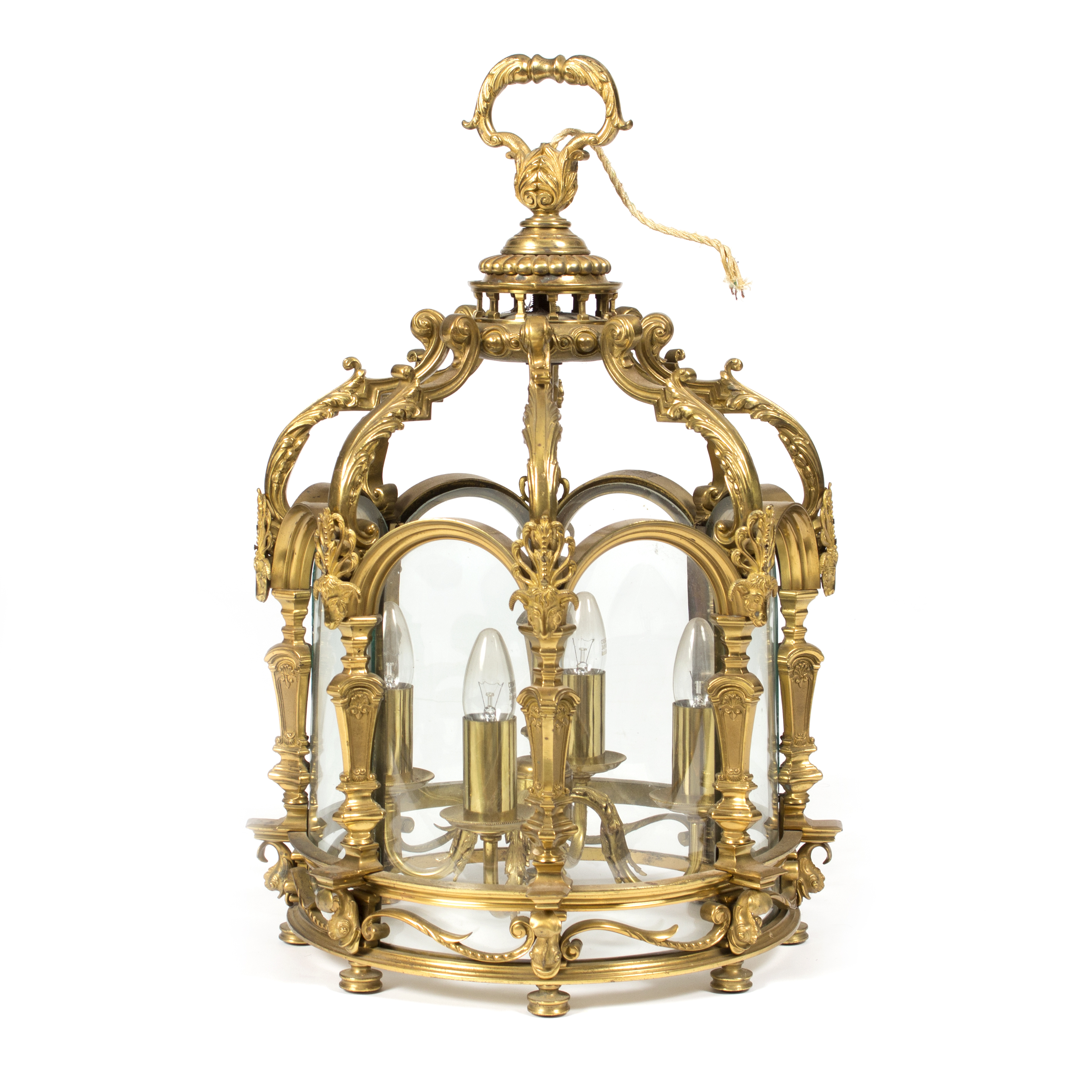 A Louis XIV style bronze hall lantern of octagonal shape with arched glazed panels,
