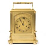 A large gilt brass quarter striking carriage clock, London circa 1850,