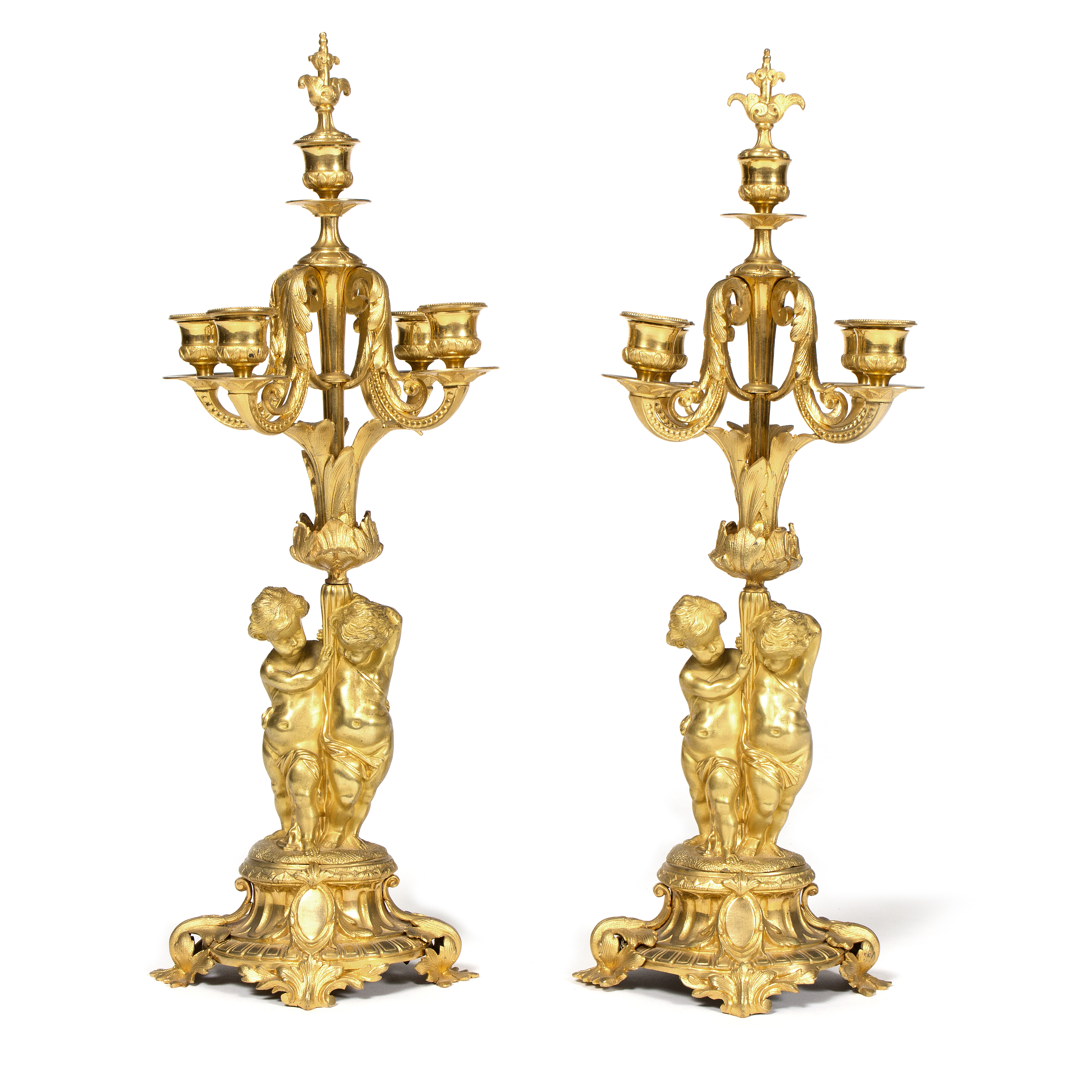 A pair of gilt metal four-branch five-light candelabra,