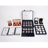 A quantity of Queen Elizabeth II commemorative coins, including £5 coins,