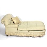 A Victorian button upholstered day bed, on turned legs with ceramic castors,