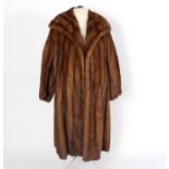 A mid brown mink fur coat,