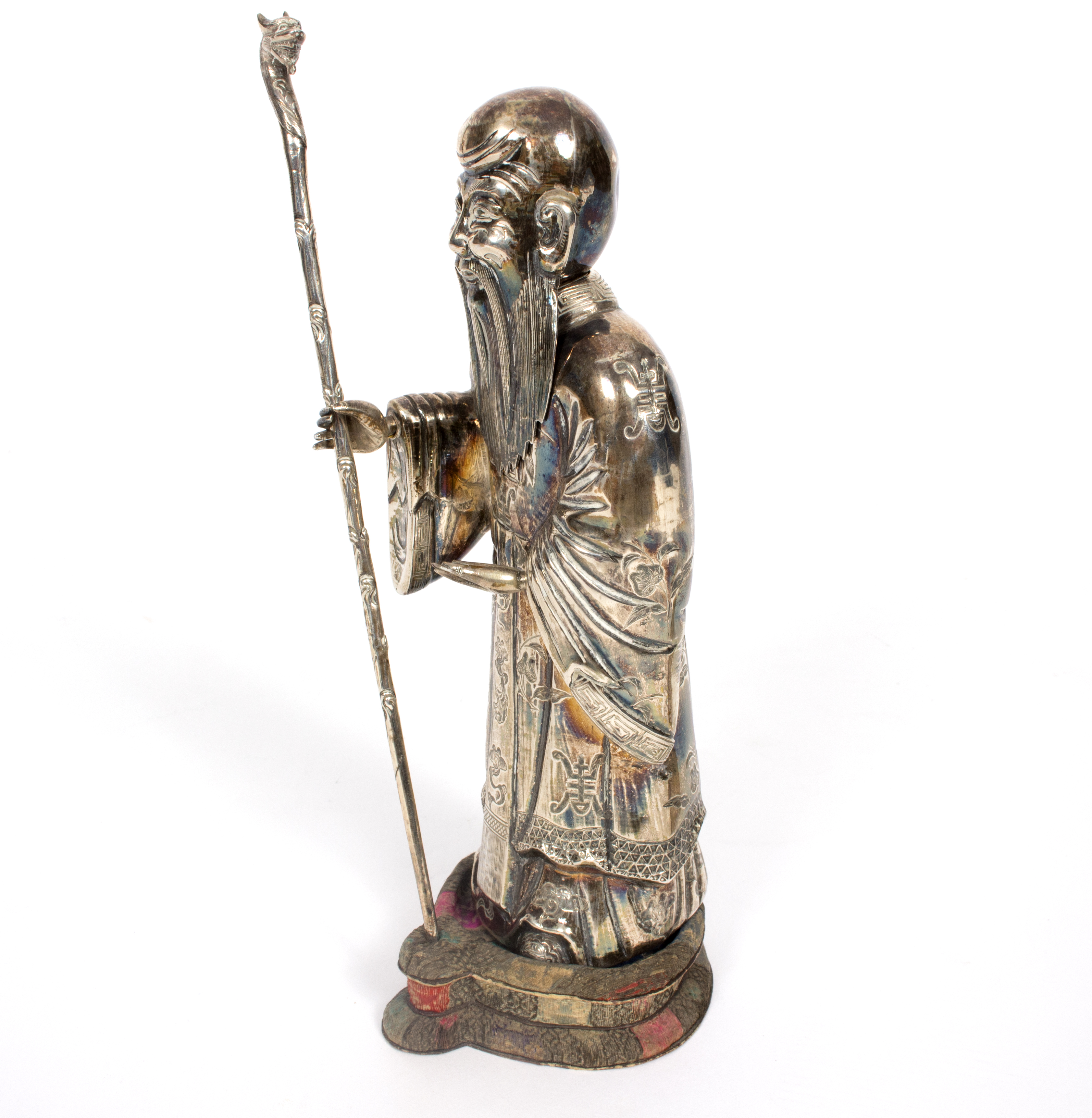 A silver coloured metal figure of a bearded immortal wearing a Mandarin coat and holding a staff, - Image 2 of 3