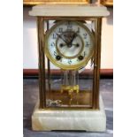 An early 20th Century brass and alabaster mantel clock, with twin winding holes,