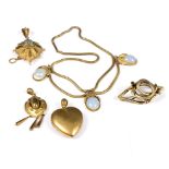 A small group of 19th Century gilt metal jewellery to include a graduated necklace with opalescent