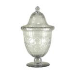 A large glass vase and cover cut with a wide border of stars,