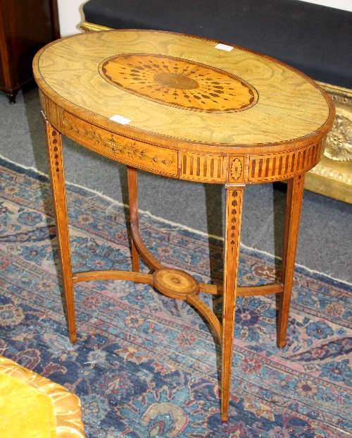 An Edwardian oval occasional table,