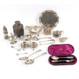 A quantity of silver to include a Queen Anne caster, an embossed tea caddy and cover, a salver,