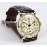 A Girard Perregaux gold cased chronograph wristwatch, three subsidiary dials,