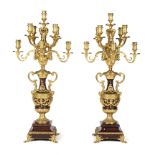 A pair of 19th Century gilt metal nine-light candelabra,