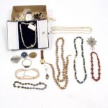 A quantity of costume jewellery to include a cultured pearl necklace and strings of beads