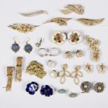 A group of Trifari brooches,