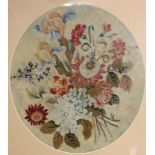 A pair of Victorian oval needlework panels depicting flowers, 35.