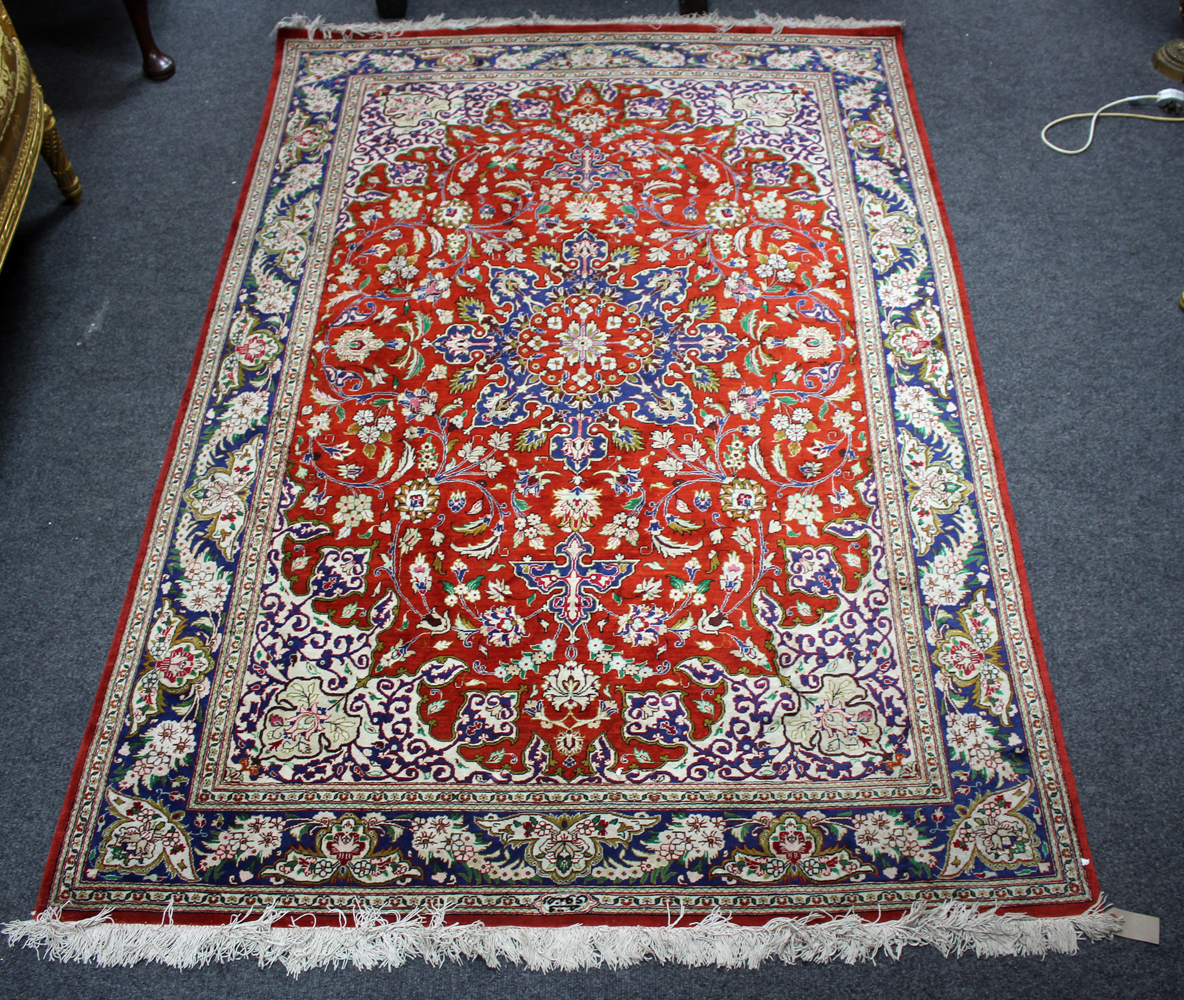 A Tabriz silk rug, North West Persia, signed,