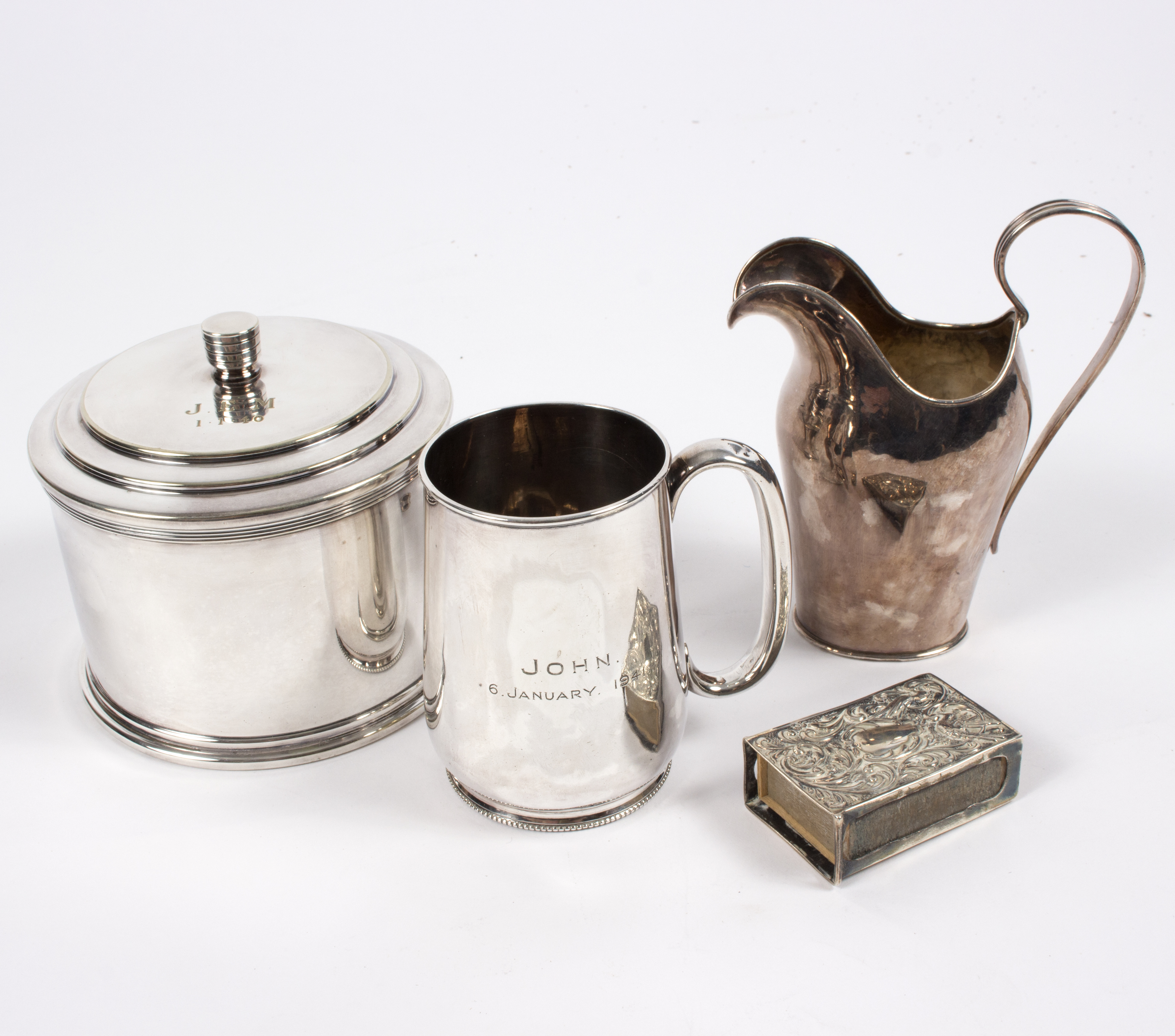 A silver tankard, a plated jug,