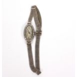 An Art Deco ladies diamond set cocktail watch,