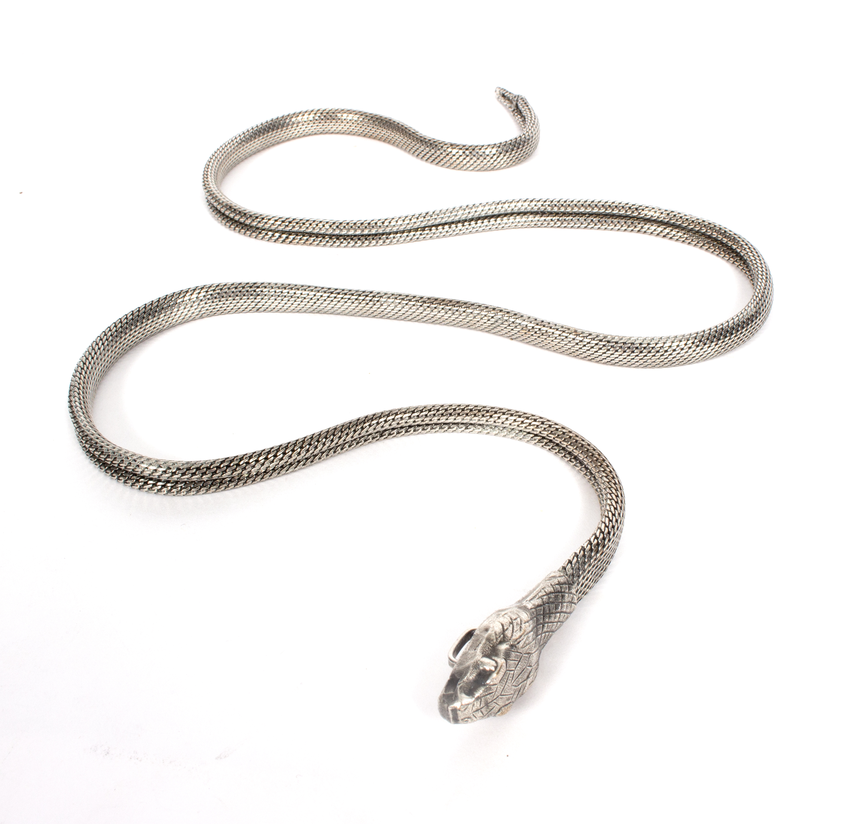 An Indian silver reticulated belt in the form of a snake with engraved snake head clasp,