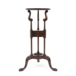 A George III style mahogany wig stand, fitted two small drawers, on a tripod base, 79.