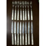 A set of eight silver fruit knives and forks, Sheffield 1926,